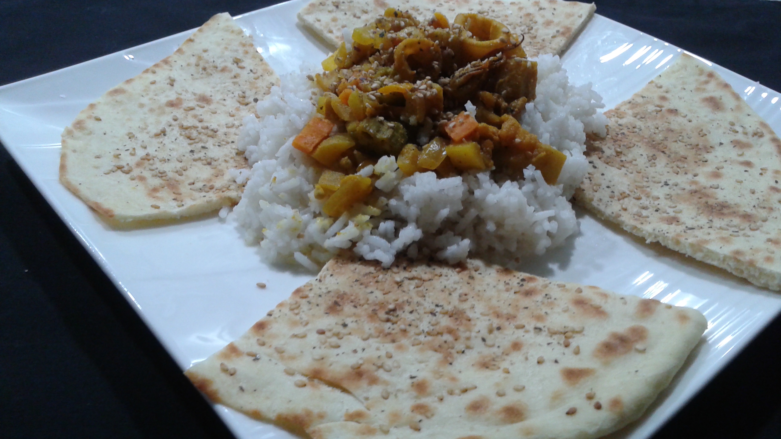 Zanzibar Sesame Flat Bread with Calamari Curry and Coconut Rice ...